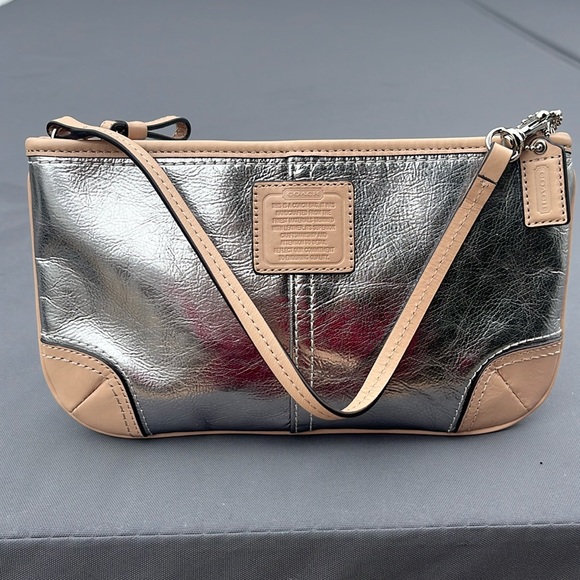 Coach Handbags - Coach, silver leather wristlet in excellent condition